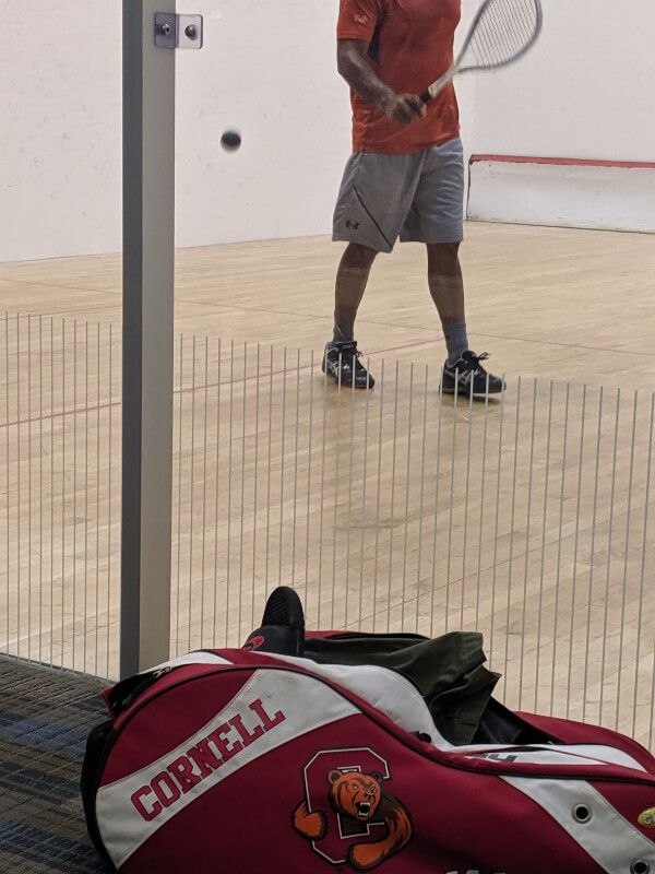 Orlando Squash with squash player playing squash in Orlando squash courts